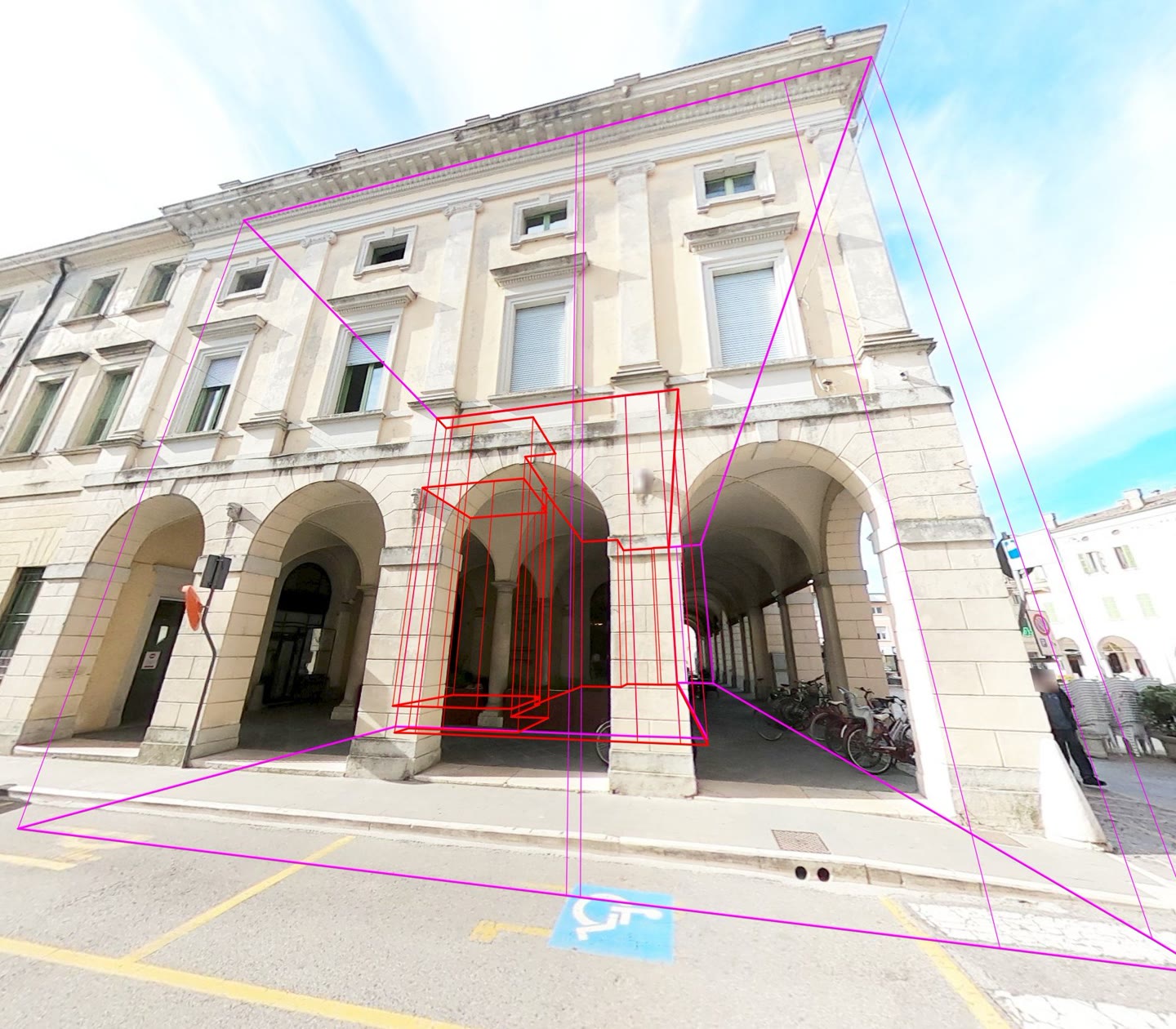 A street photograph of the town hall's arcade with the survey's outline drawn over it in red and the camera's frame in magenta