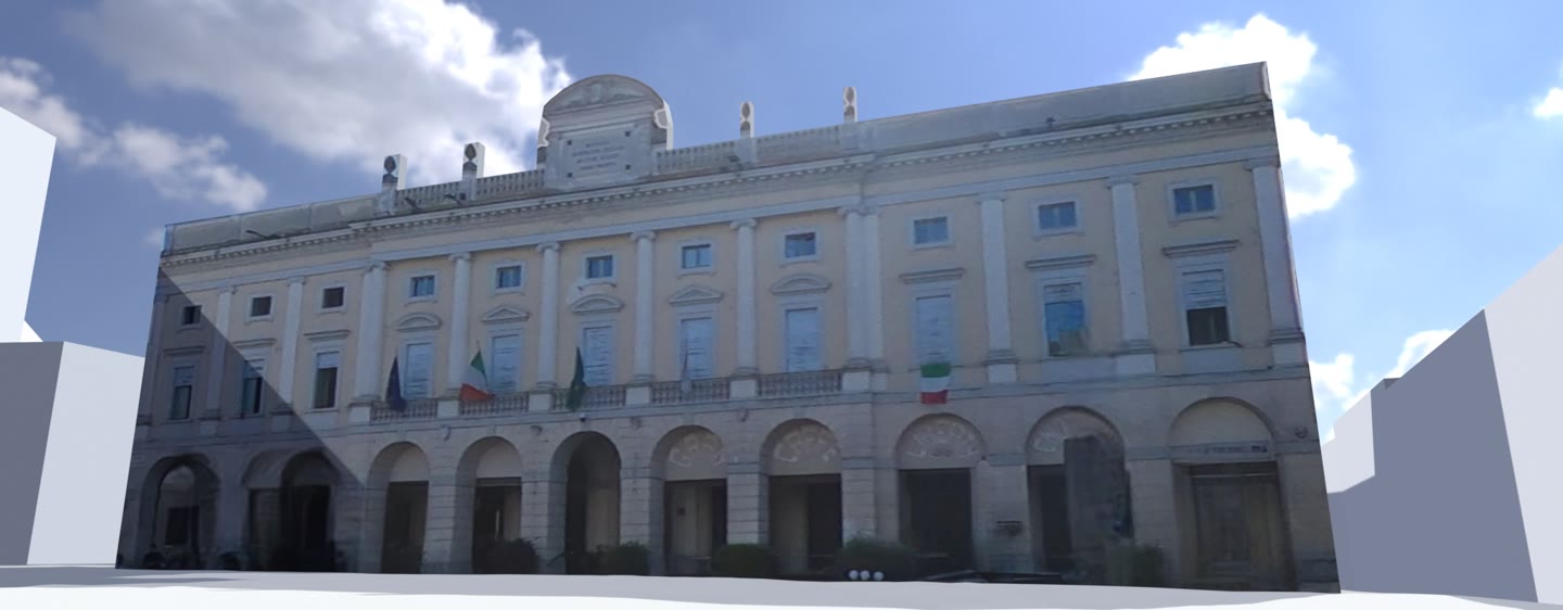 The model of the town hall from the west camera, the photographs on its walls